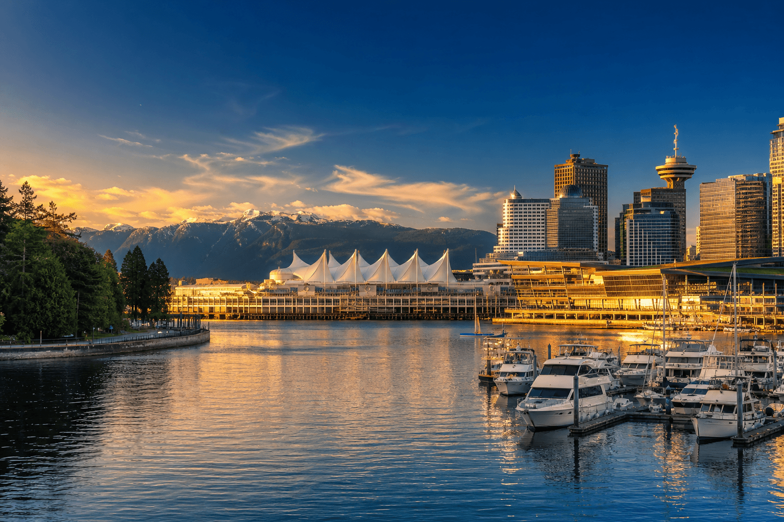 Coal Harbour waterfront with Canada Place, marina yachts and North Shore Mountains, Vancouver